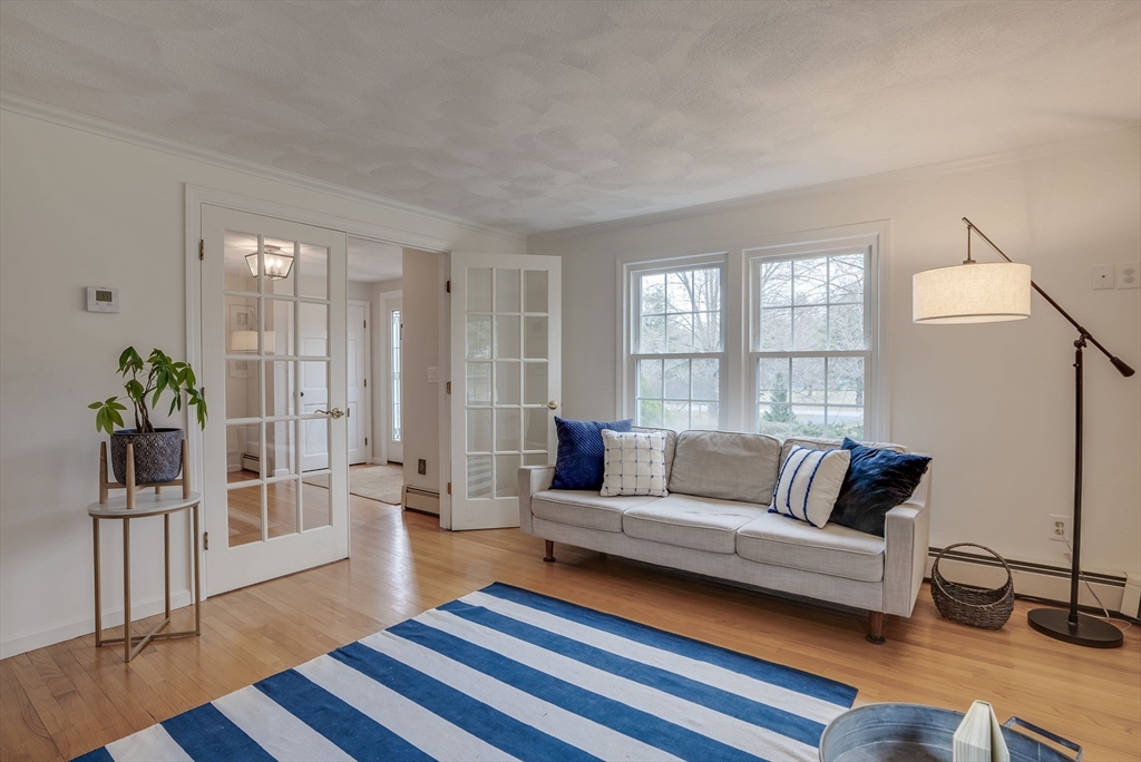71 Houghton's Mill Road Lunenburg, MA 01462 - Photo 8 of 39 a living room with furniture and wooden floor