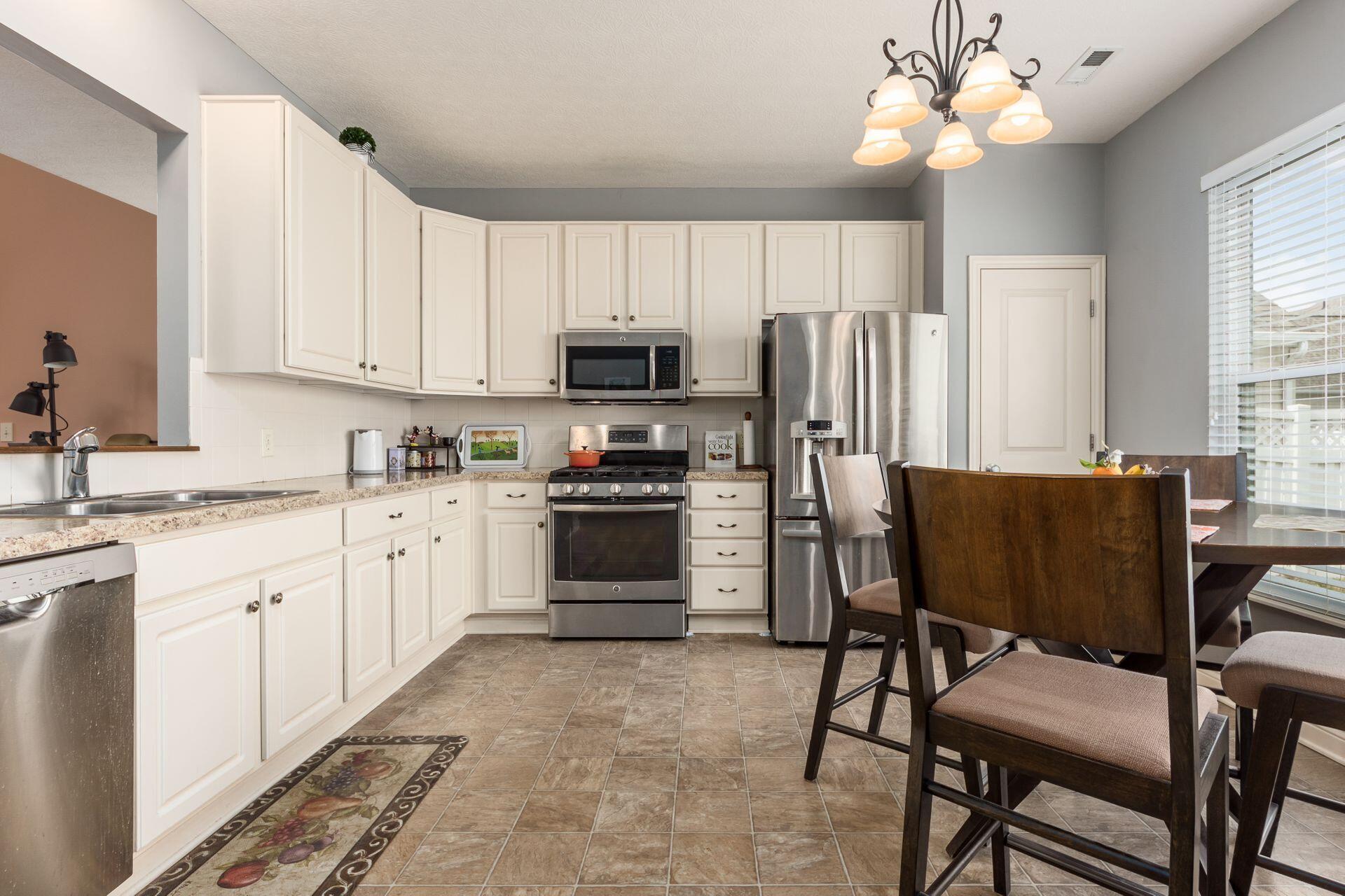 5892 McInnis Road Dublin, OH 43016 - Photo 10 of 33 Lots of cabinet space!