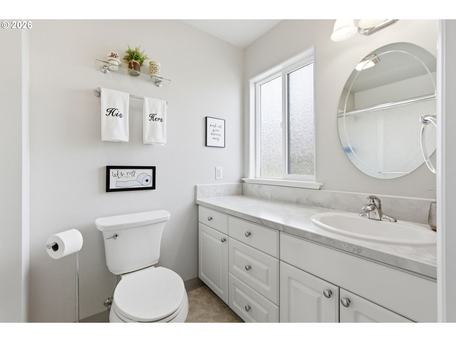 4064 Barrett Street South Salem, OR 97302 - Photo 18 of 48 a bathroom with a toilet sink and mirror
