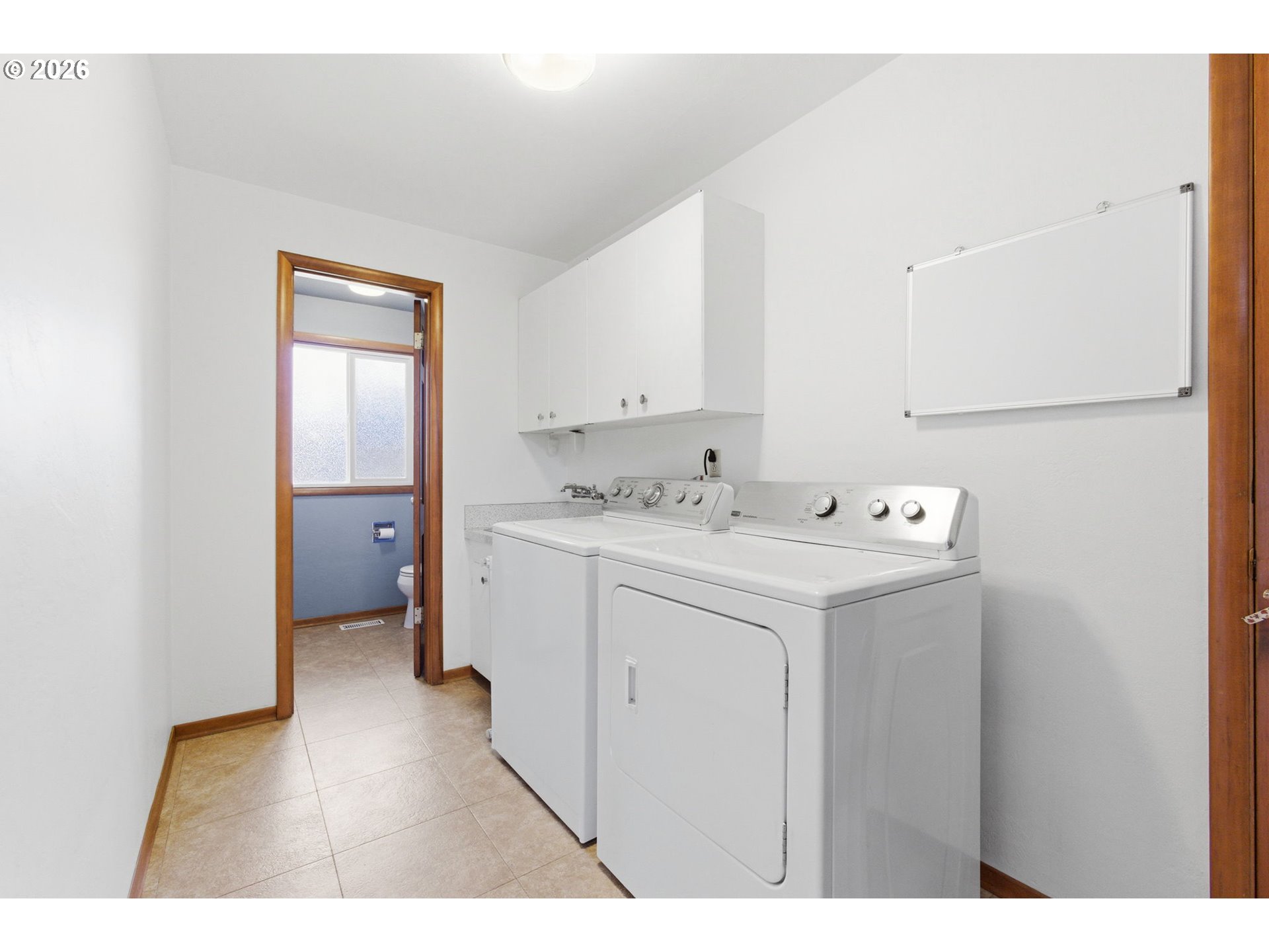 4064 Barrett Street South Salem, OR 97302 - Photo 24 of 48 a utility room with closet dryer and washer