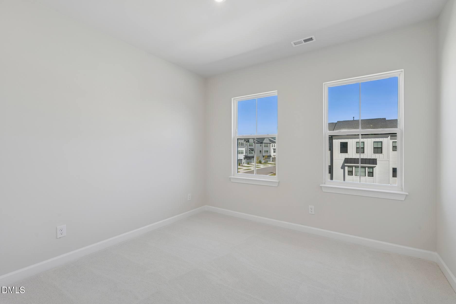 4505 Mint Leaf Lane Raleigh, NC 27612 - Photo 11 of 20 Elm Park 35_Bedroom 2_10.9.25_webready