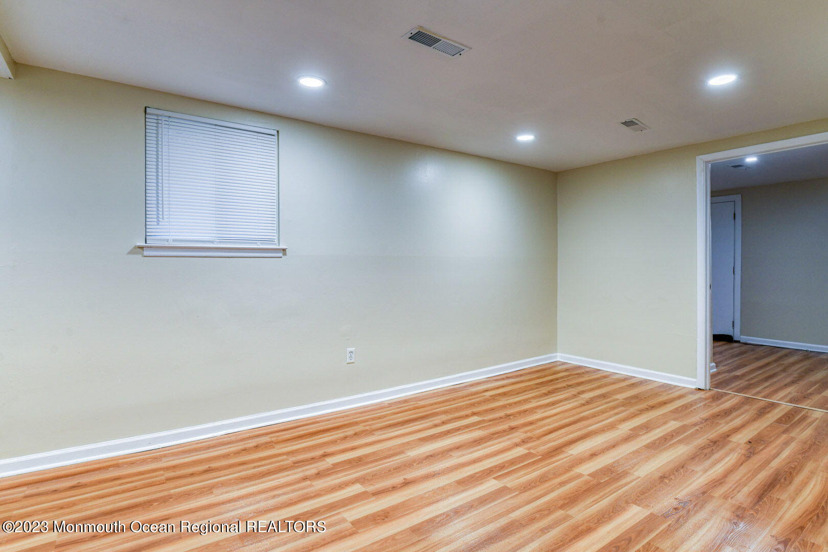 136 Newbury Road Howell, NJ 07731 - Photo 31 of 33 a view of empty room with wooden floor