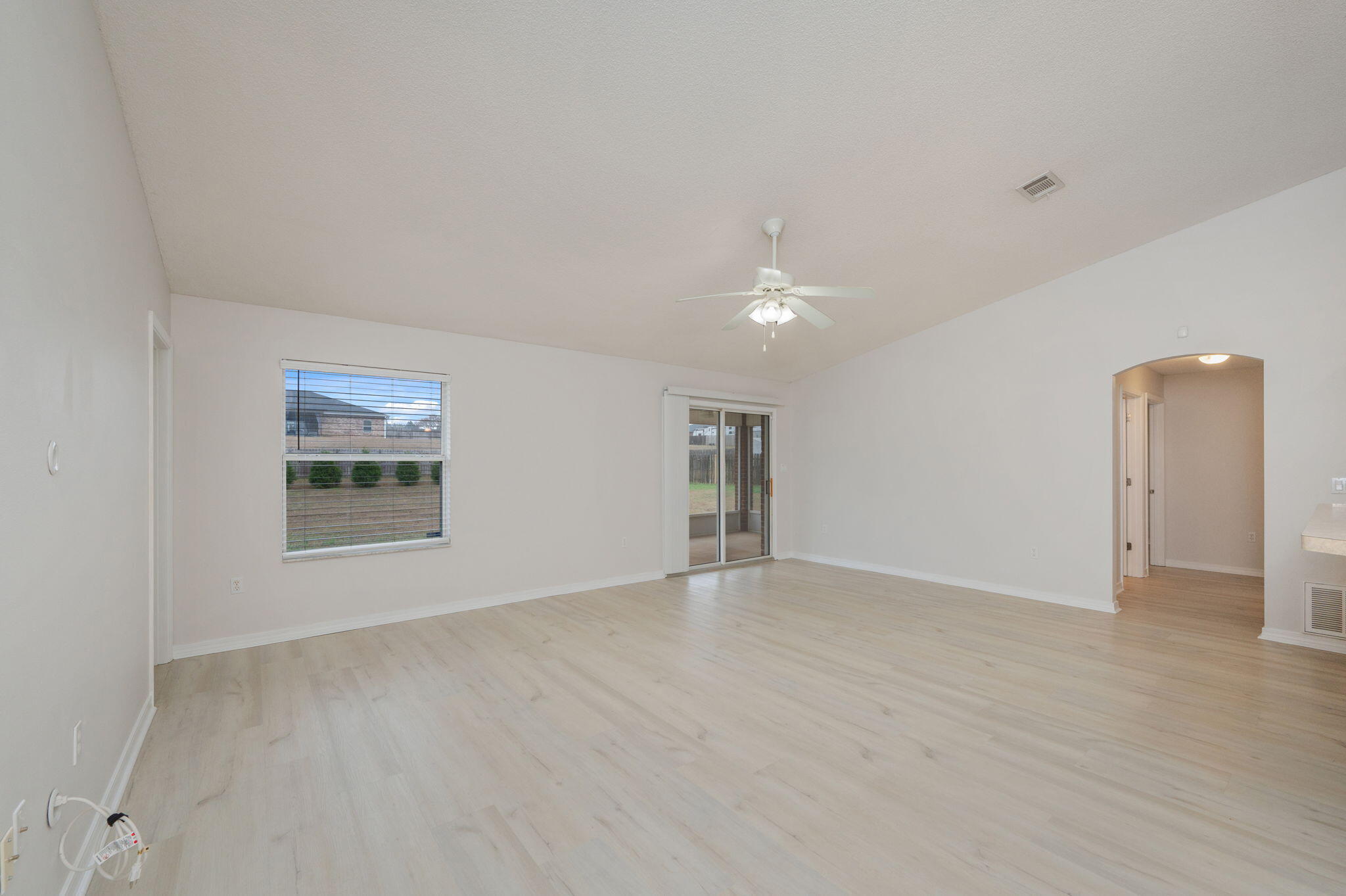 2405 Cumberland Way Crestview, FL 32536 - Photo 11 of 47 a view of an empty room with a window