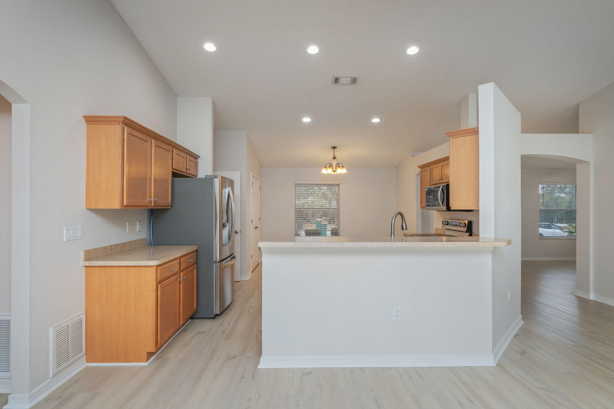 2405 Cumberland Way Crestview, FL 32536 - Photo 14 of 47 a view of kitchen with stainless steel appliances granite countertop refrigerator sink and stove