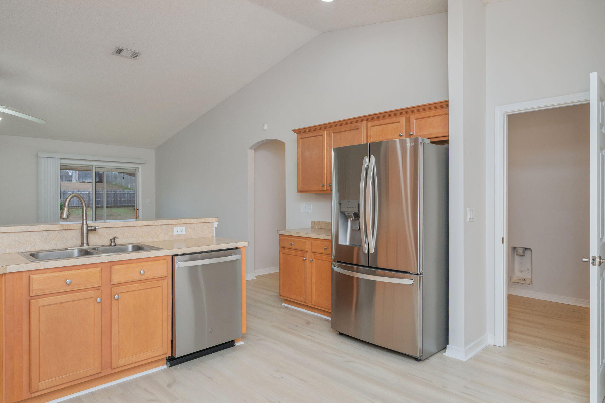2405 Cumberland Way Crestview, FL 32536 - Photo 16 of 47 a kitchen with a refrigerator sink and stove