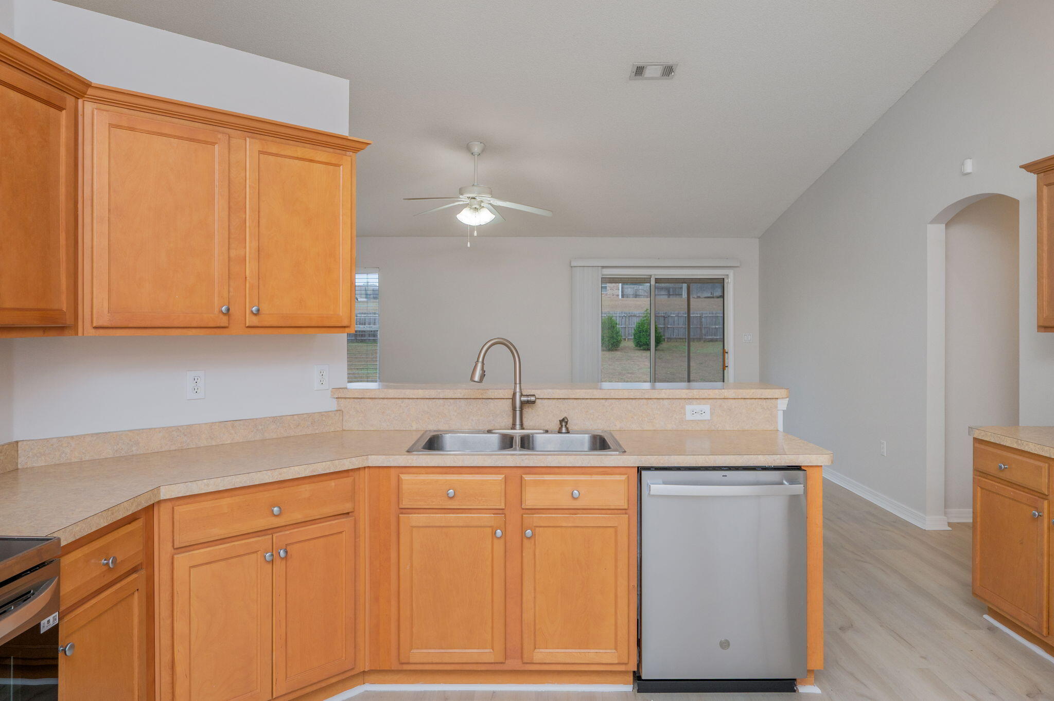 2405 Cumberland Way Crestview, FL 32536 - Photo 17 of 47 a kitchen with a sink and cabinets