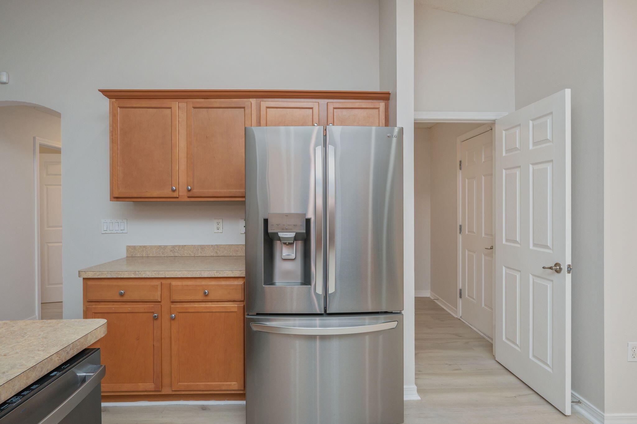 2405 Cumberland Way Crestview, FL 32536 - Photo 18 of 47 a kitchen with stainless steel appliances granite countertop a refrigerator and a stove top oven