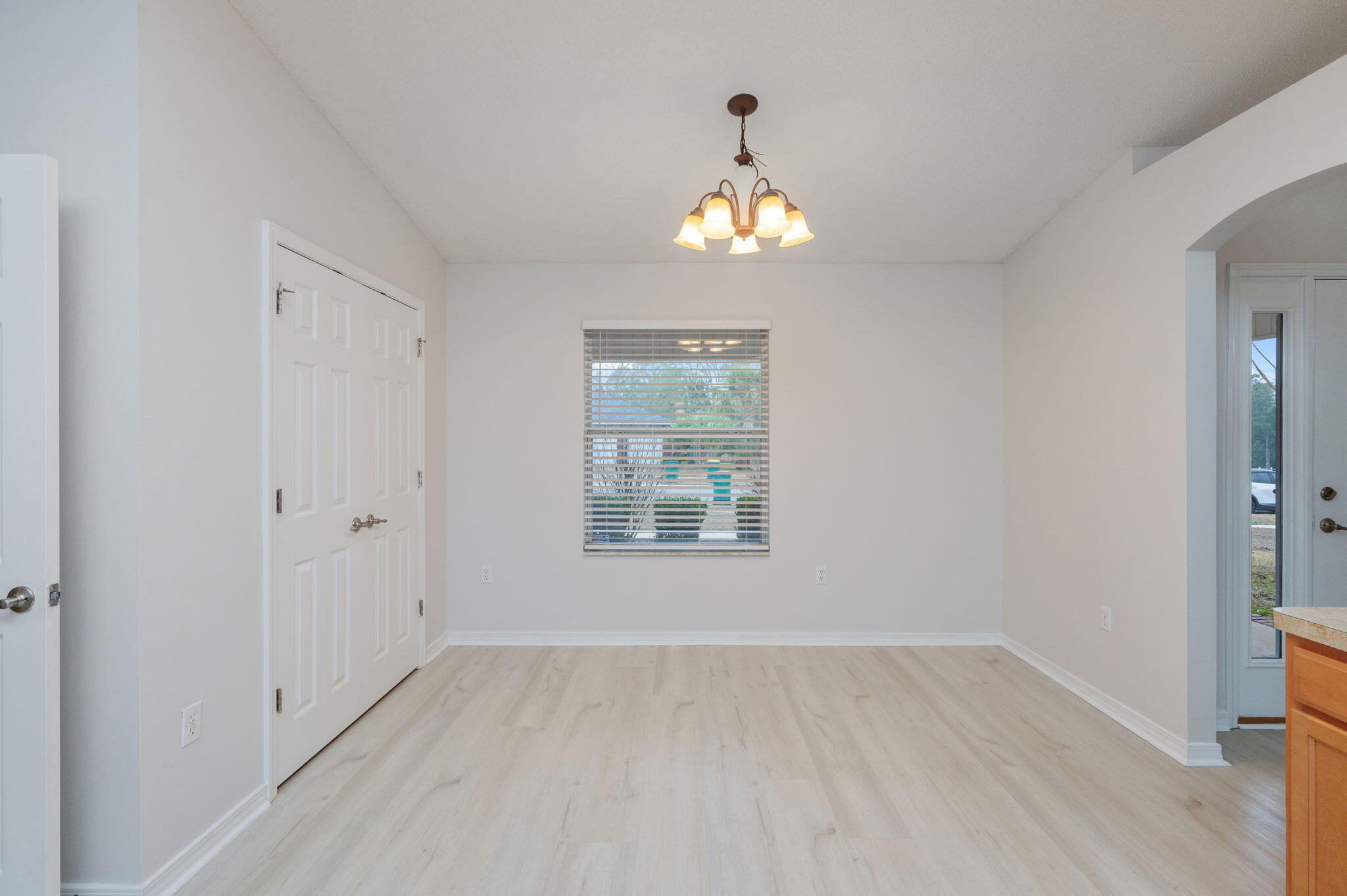 2405 Cumberland Way Crestview, FL 32536 - Photo 19 of 47 a view of an empty room with a window