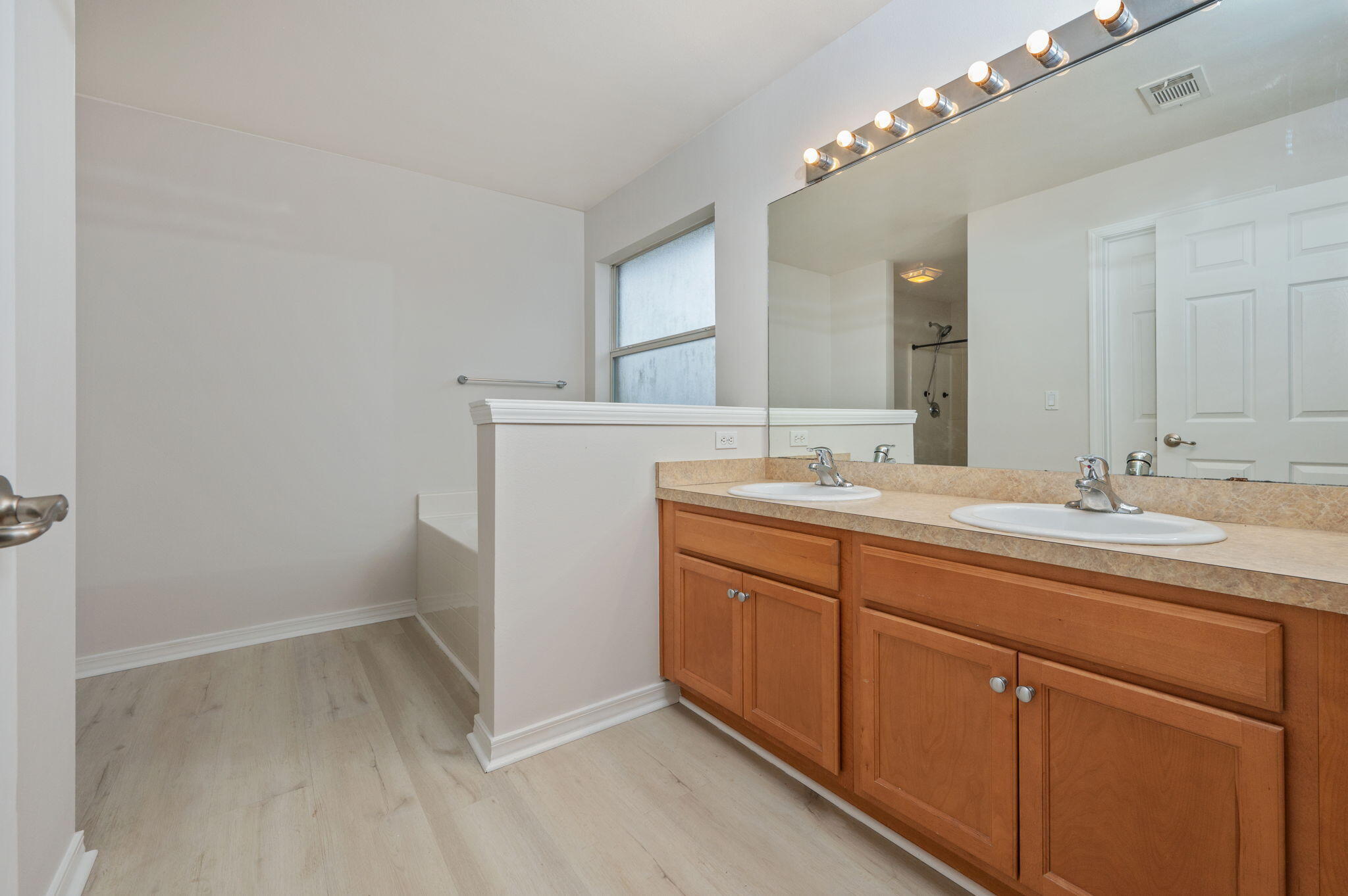 2405 Cumberland Way Crestview, FL 32536 - Photo 22 of 47 a bathroom with a sink and a mirror