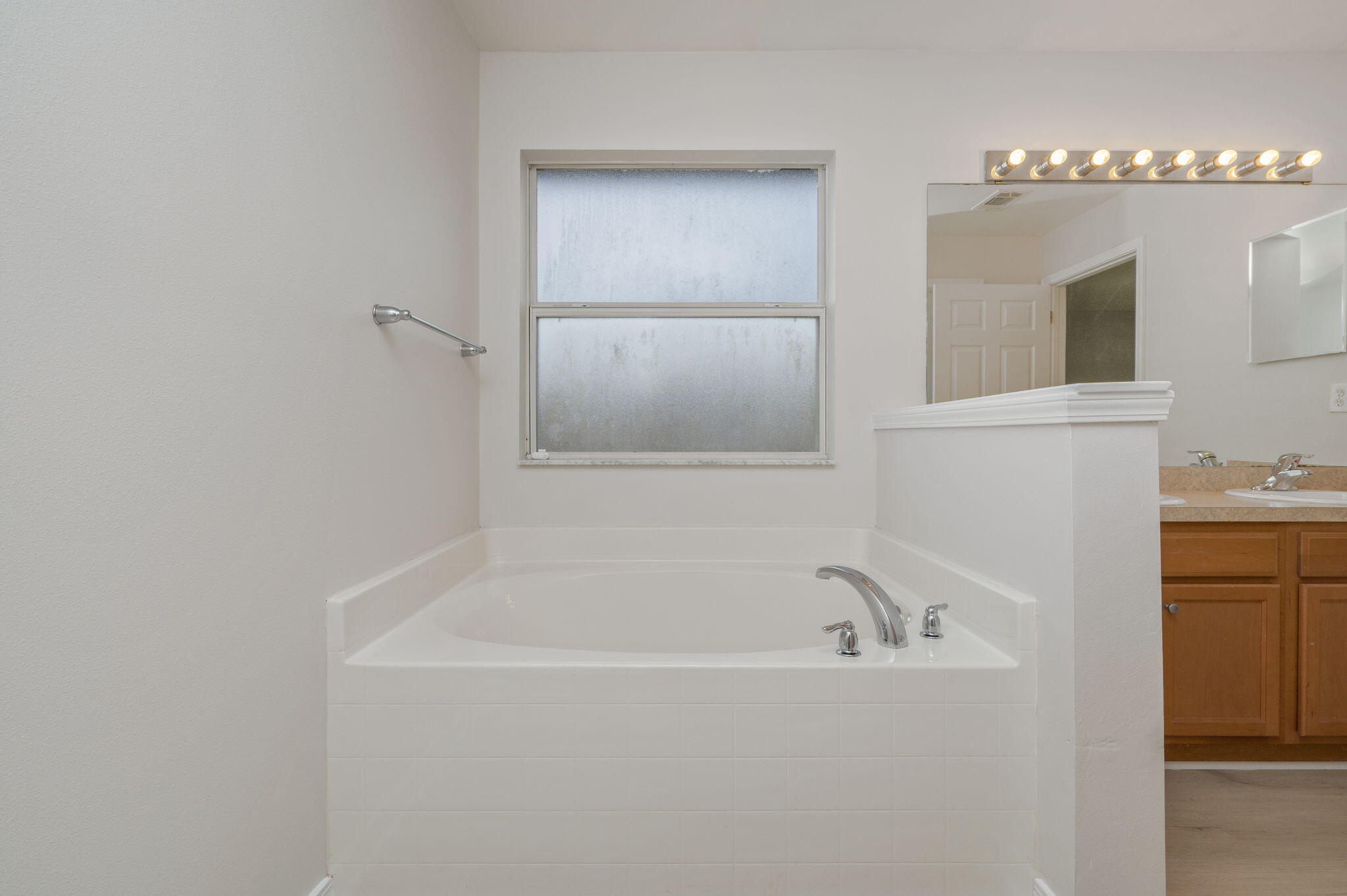 2405 Cumberland Way Crestview, FL 32536 - Photo 23 of 47 a white bath tub sitting in a bathroom