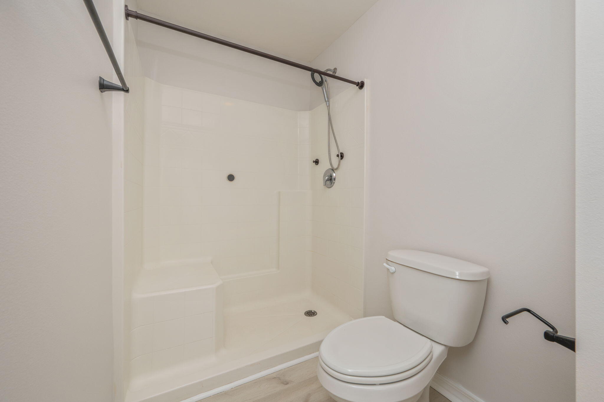 2405 Cumberland Way Crestview, FL 32536 - Photo 26 of 47 a white toilet next to a bathroom sink