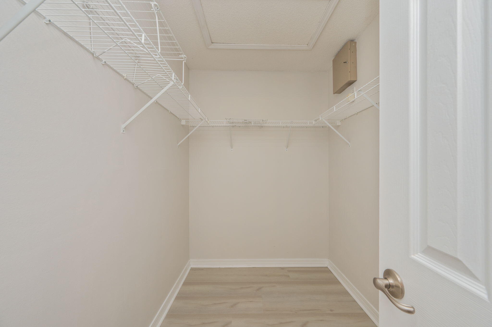 2405 Cumberland Way Crestview, FL 32536 - Photo 27 of 47 a view of small space with racks on the wall