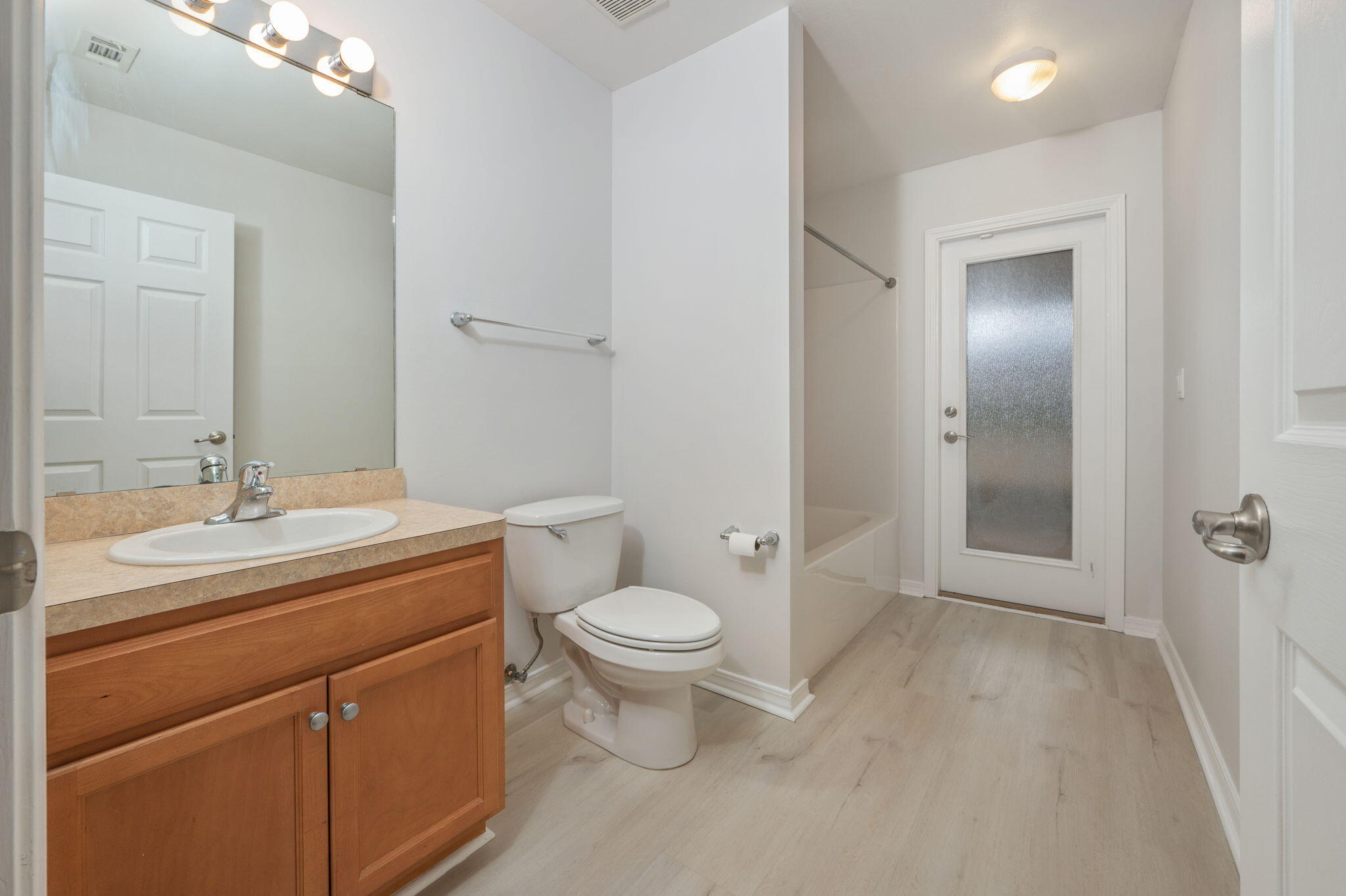 2405 Cumberland Way Crestview, FL 32536 - Photo 34 of 47 a bathroom with a toilet sink and mirror