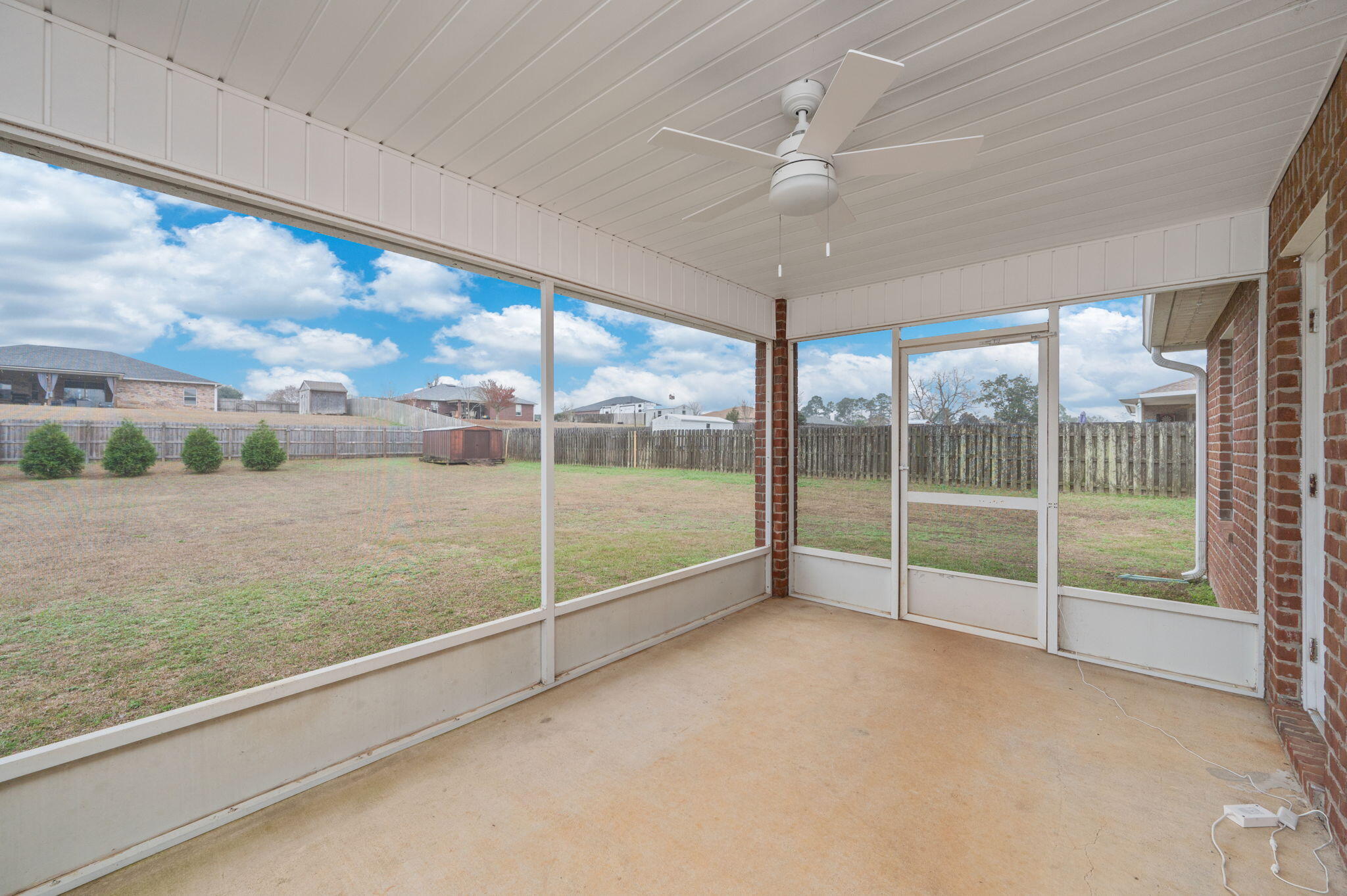 2405 Cumberland Way Crestview, FL 32536 - Photo 38 of 47 a view of an empty room with windows and city view