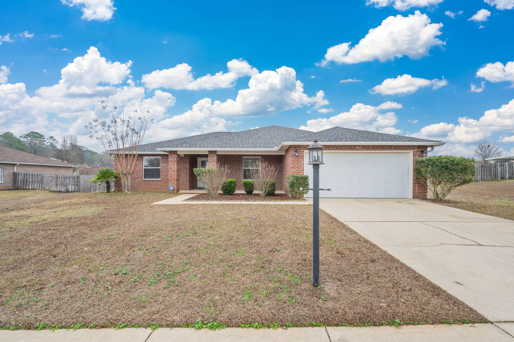 2405 Cumberland Way Crestview, FL 32536 - Photo 4 of 47 a view of a house with backyard