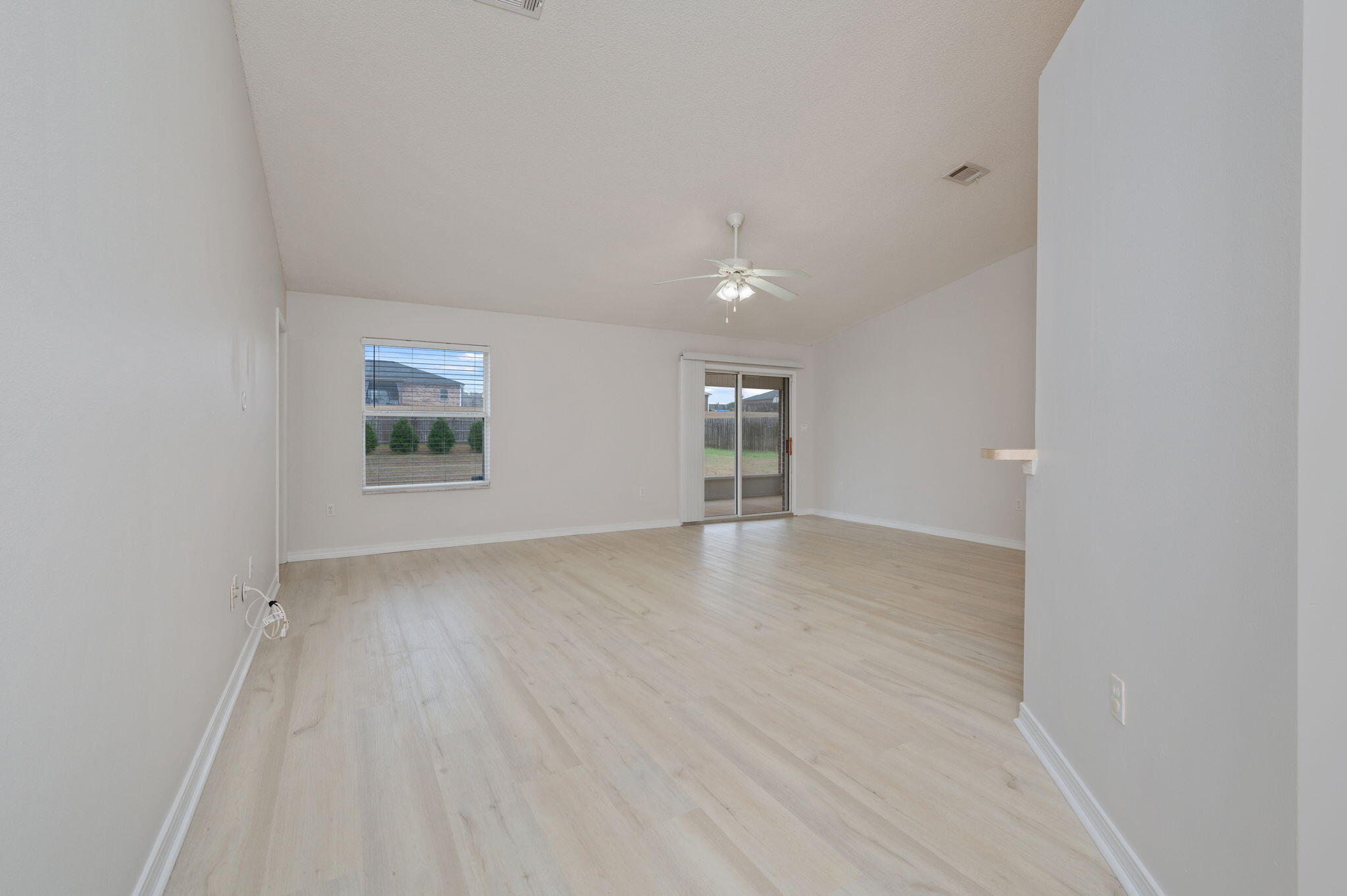 2405 Cumberland Way Crestview, FL 32536 - Photo 10 of 47 an empty room with windows and closet