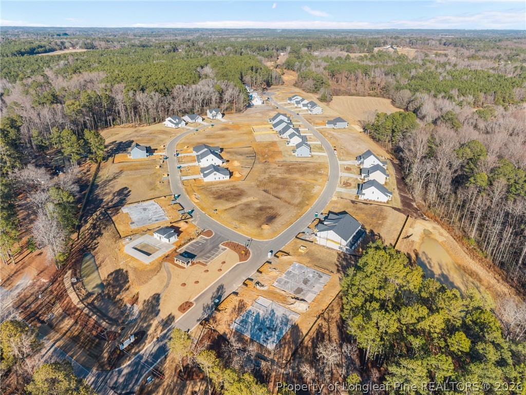 287 Elijah Way Vass, NC 28394 - Photo 12 of 49 an aerial view of residential houses with outdoor space