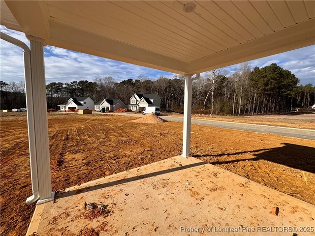 a view of a backyard of water and mountain view