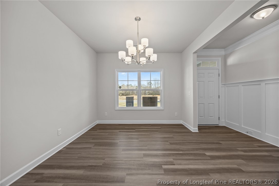 287 Elijah Way Vass, NC 28394 - Photo 14 of 49 a view of an empty room with a window