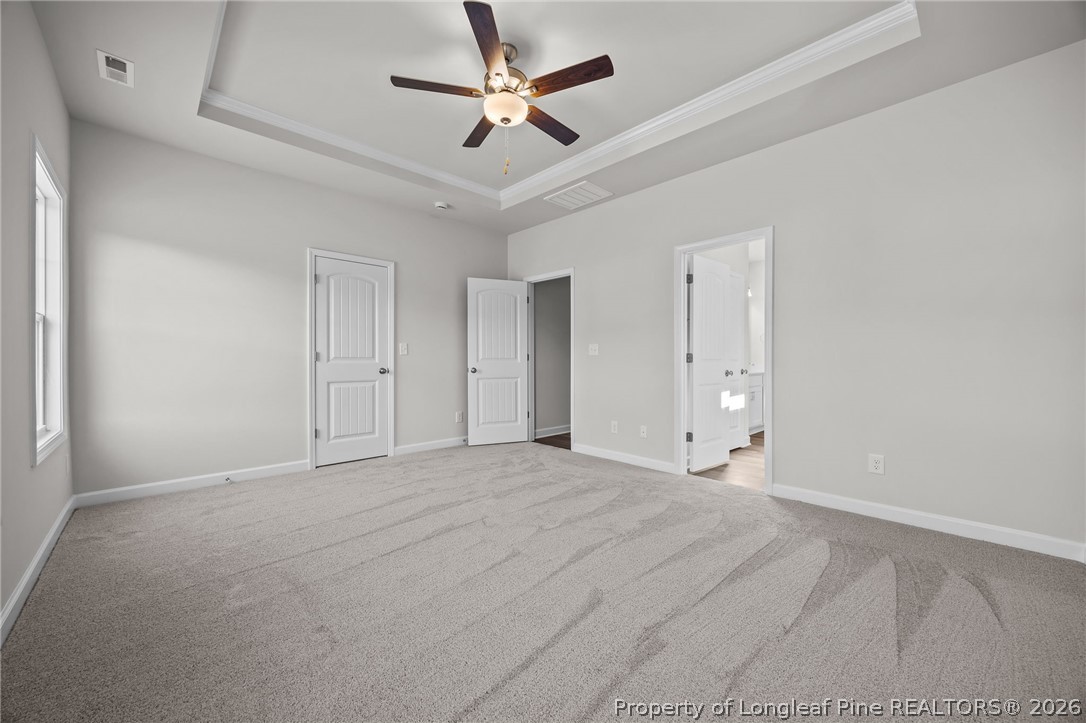 287 Elijah Way Vass, NC 28394 - Photo 29 of 49 a view of an empty room with a ceiling fan
