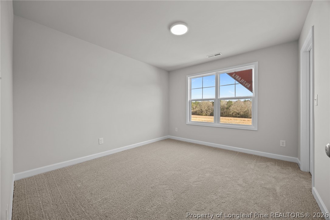 287 Elijah Way Vass, NC 28394 - Photo 33 of 49 an empty room with a window