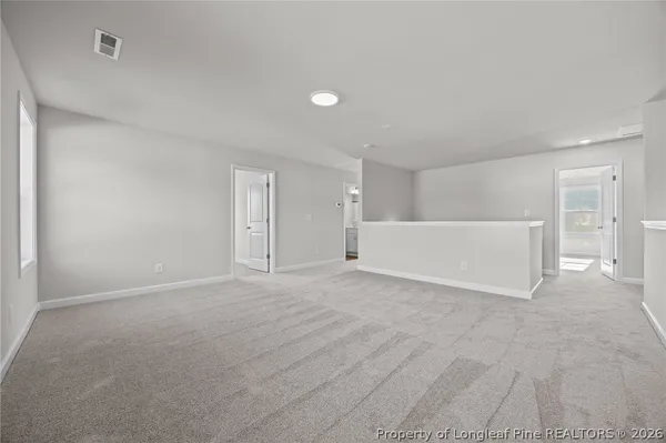 a house with trees in the background