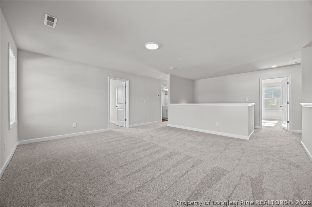 287 Elijah Way Vass, NC 28394 - Photo 36 of 49 a view of an empty room with a window