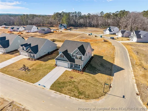 a view of a swimming pool with a lounge chairs