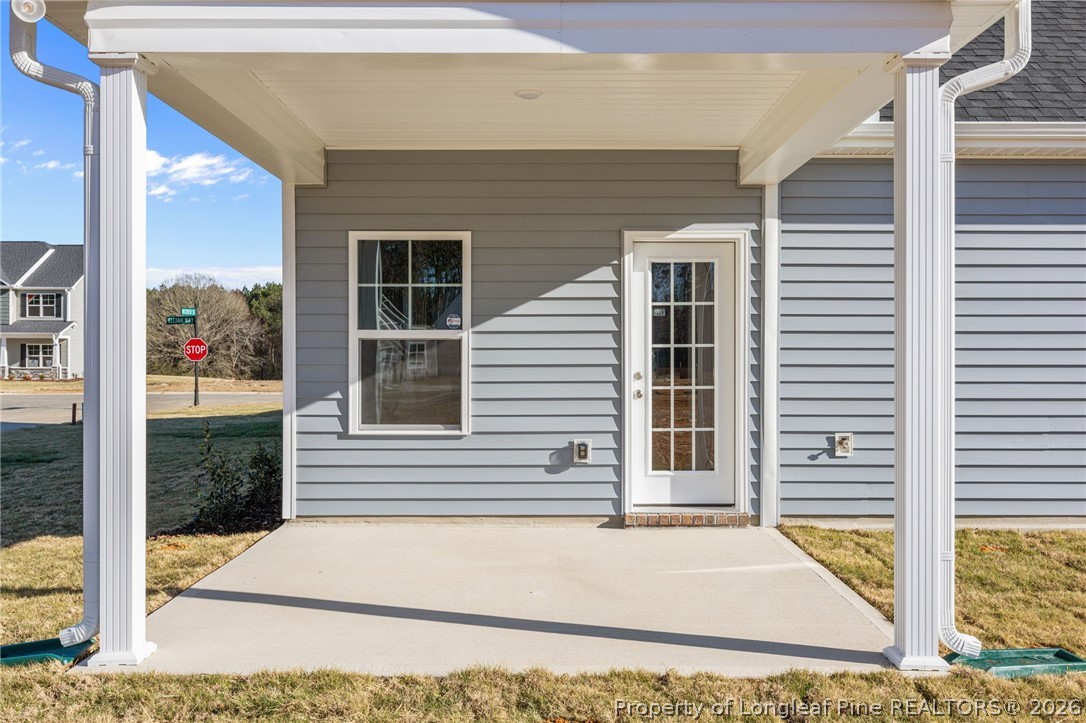 287 Elijah Way Vass, NC 28394 - Photo 49 of 49 a front view of a house with a garden