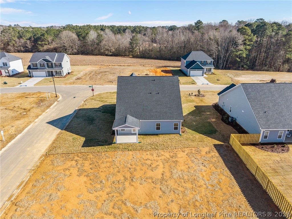 287 Elijah Way Vass, NC 28394 - Photo 7 of 49 a view of a swimming pool with a lounge chairs