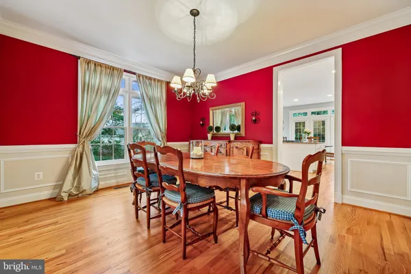 a view of a livingroom with furniture and hardwood floor