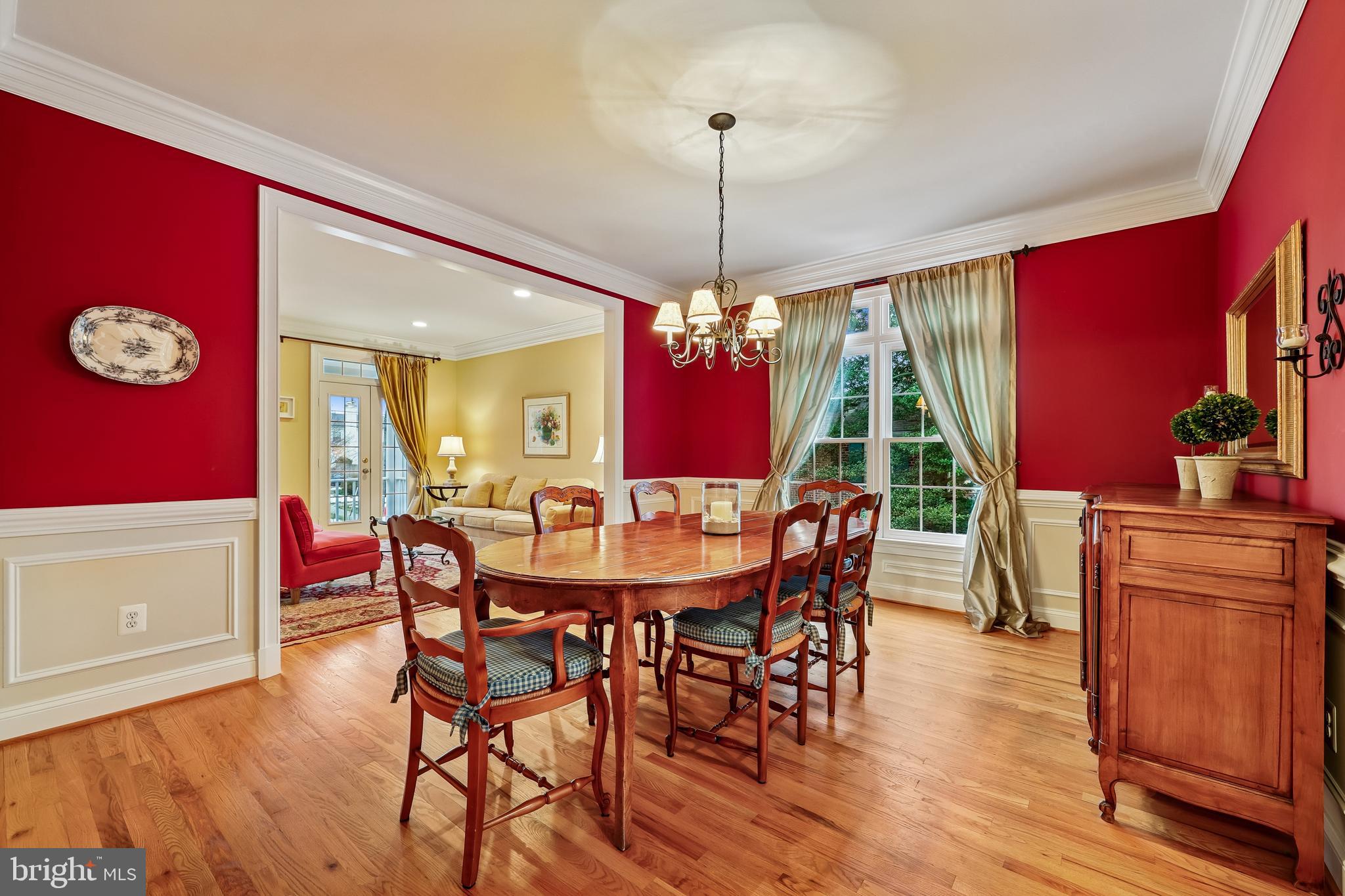 8807 Ridge Road Bethesda, MD 20817 - Photo 15 of 72 a view of a dining room with furniture window and wooden floor