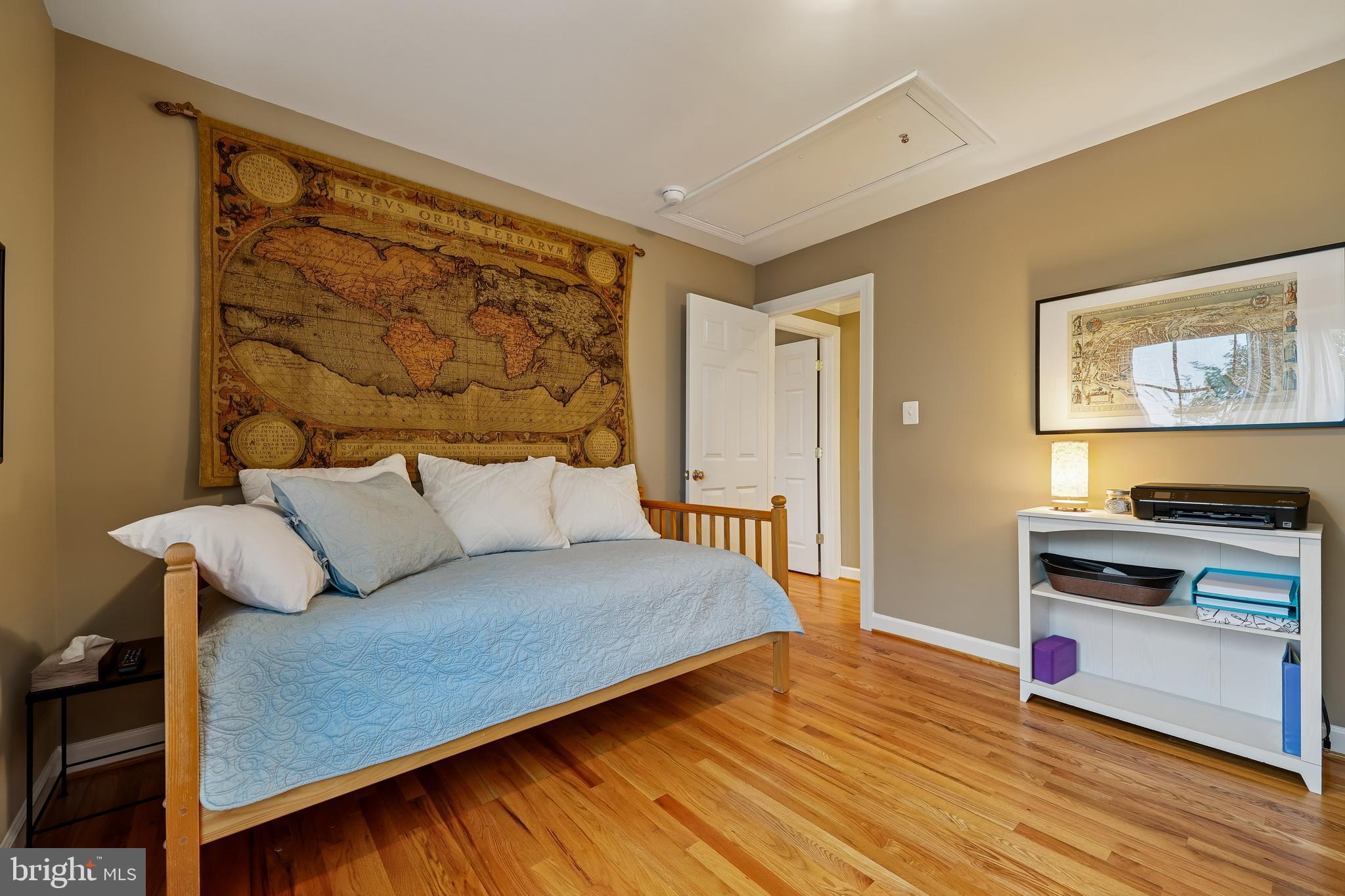 8807 Ridge Road Bethesda, MD 20817 - Photo 17 of 72 a bedroom with a bed and a flat screen tv