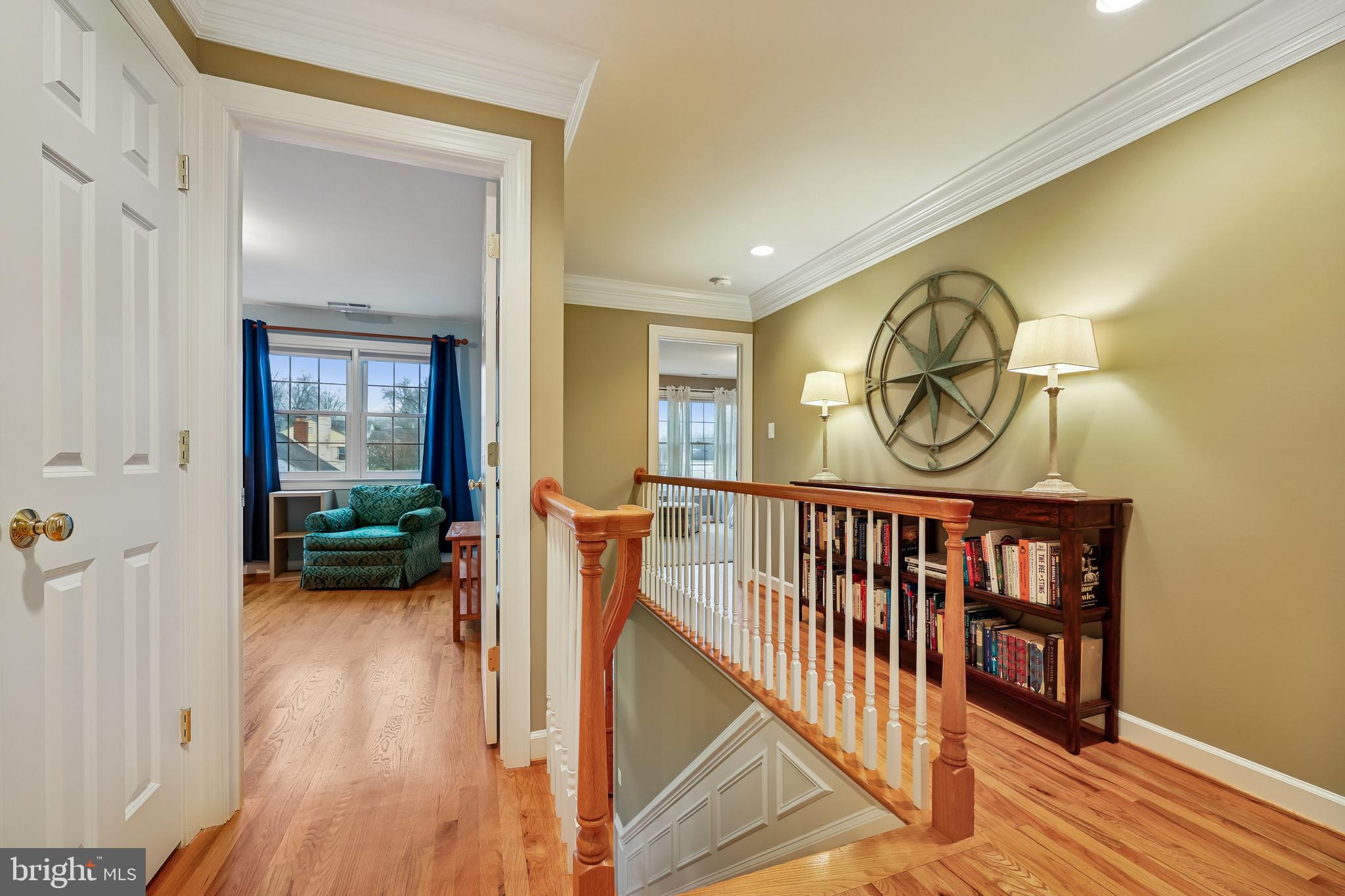 8807 Ridge Road Bethesda, MD 20817 - Photo 23 of 72 a view of a hallway and wooden floor a bedroom