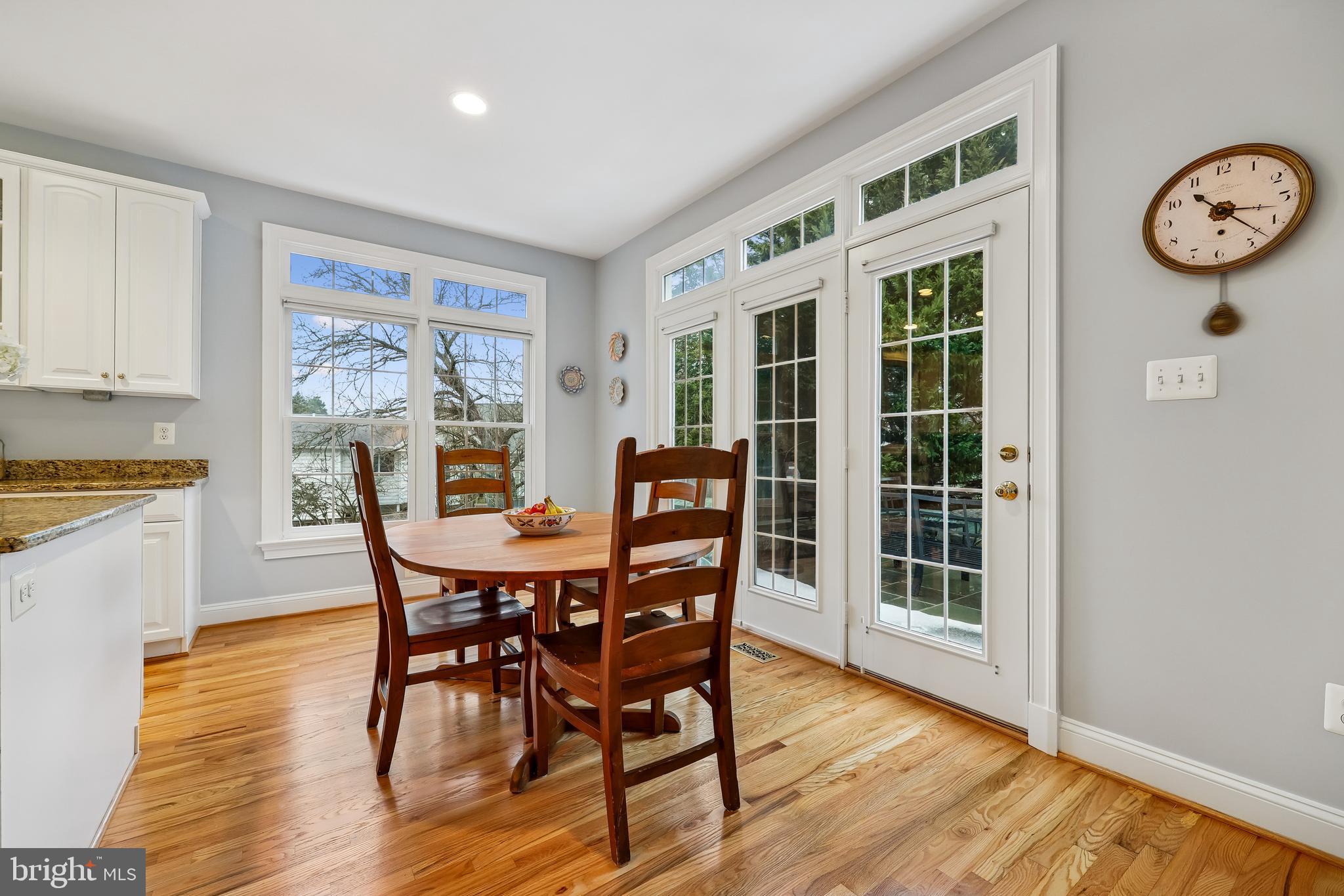 8807 Ridge Road Bethesda, MD 20817 - Photo 33 of 72 a view of a dining room with furniture window and wooden floor