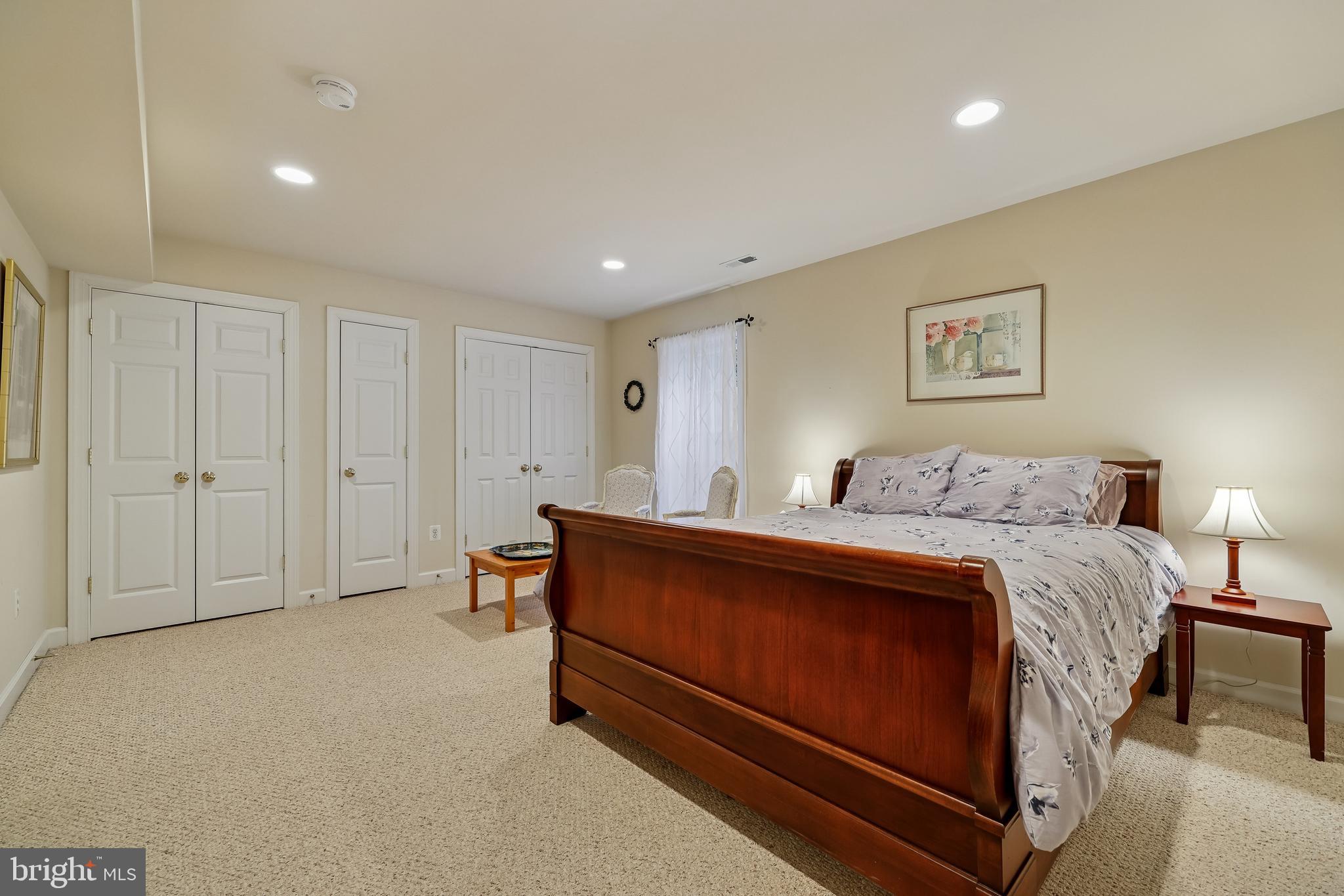 8807 Ridge Road Bethesda, MD 20817 - Photo 42 of 72 a bed room with a bed and a night stand