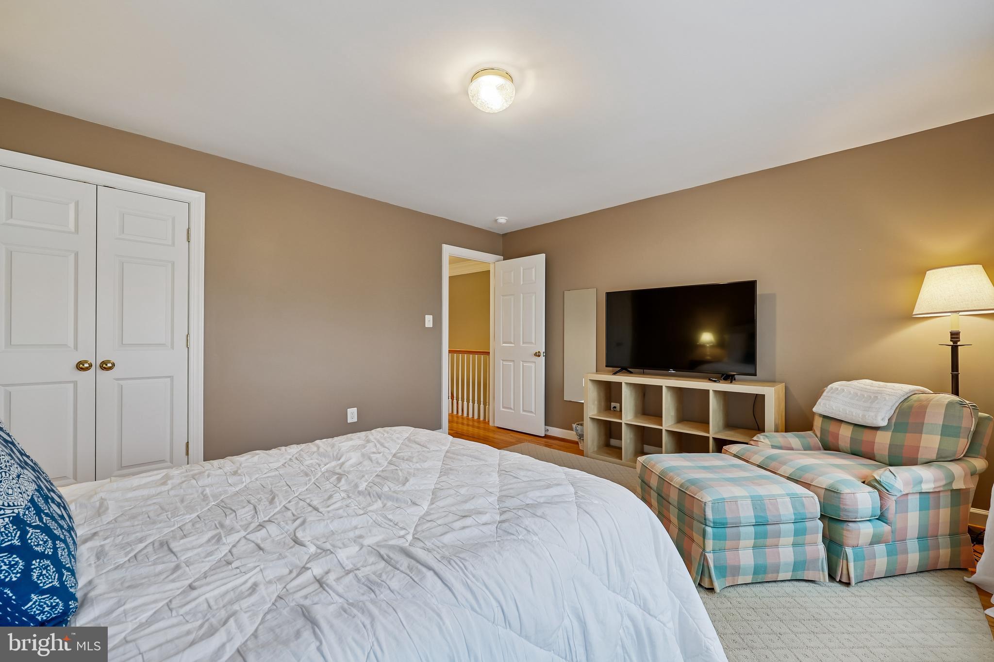 8807 Ridge Road Bethesda, MD 20817 - Photo 44 of 72 a bedroom with a bed and a flat screen tv