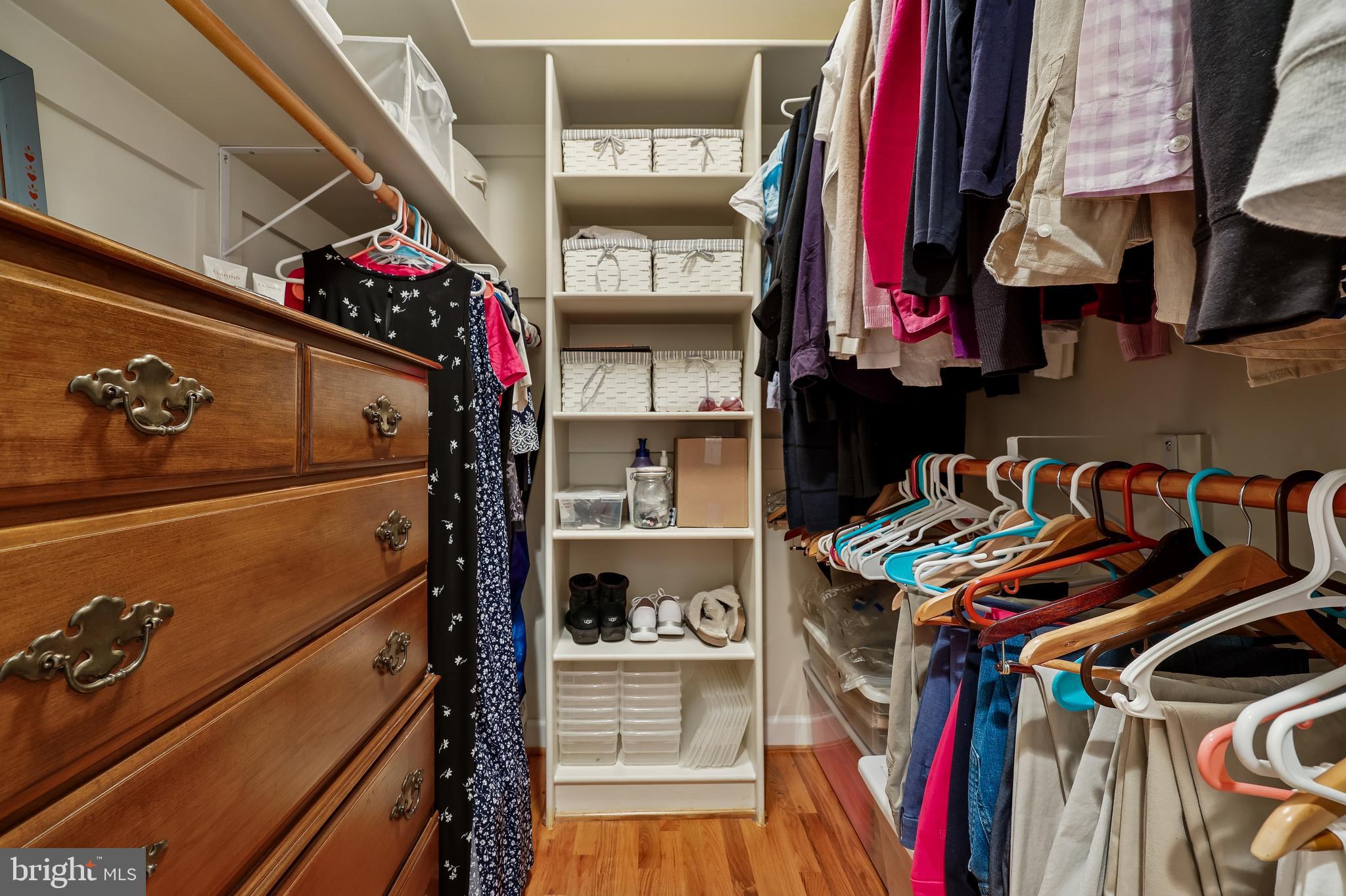 8807 Ridge Road Bethesda, MD 20817 - Photo 47 of 72 a view of walk in closet with clothes and shoes