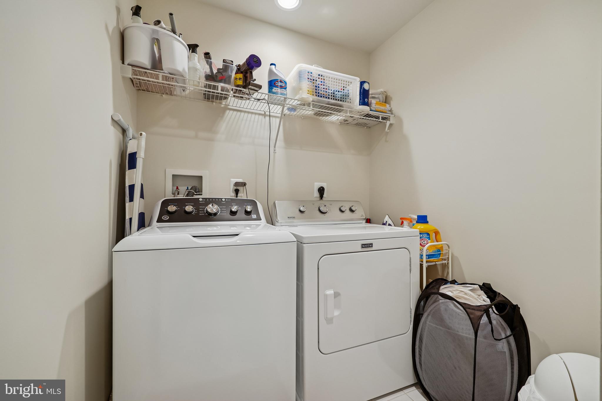 8807 Ridge Road Bethesda, MD 20817 - Photo 50 of 72 a view of storage and utility room with washer and dryer