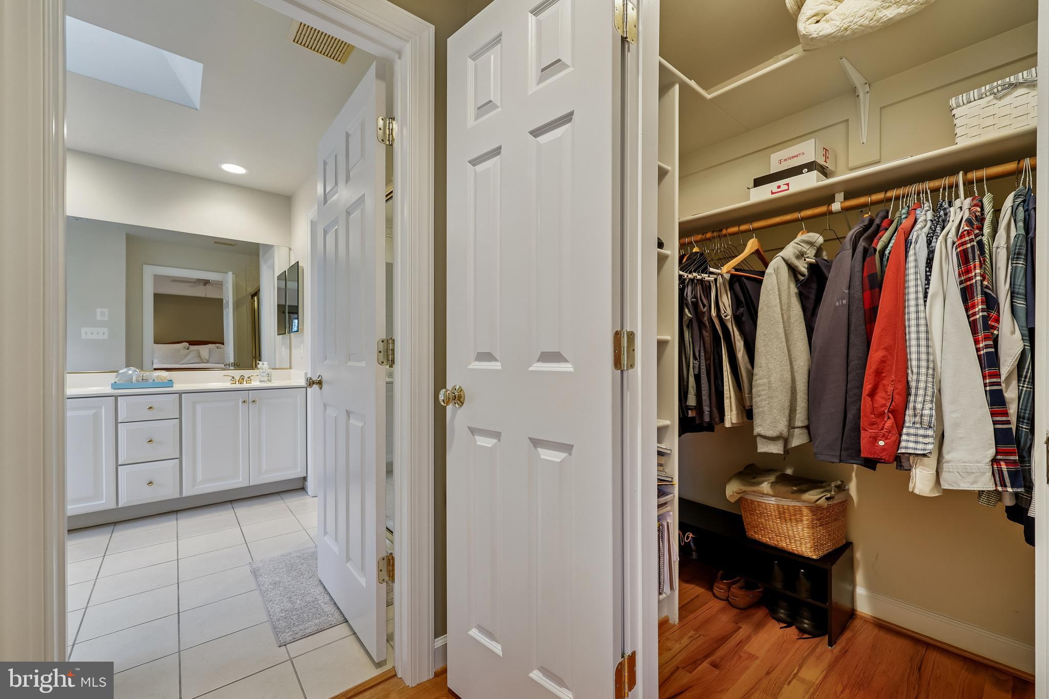 8807 Ridge Road Bethesda, MD 20817 - Photo 52 of 72 a view of walk in closet with clothes and shoes