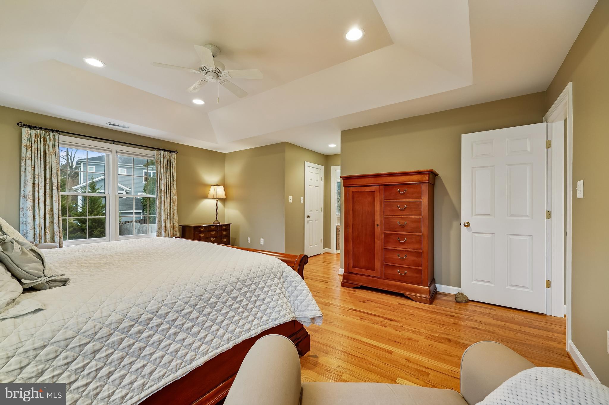 8807 Ridge Road Bethesda, MD 20817 - Photo 54 of 72 a bedroom with a large bed closet and window