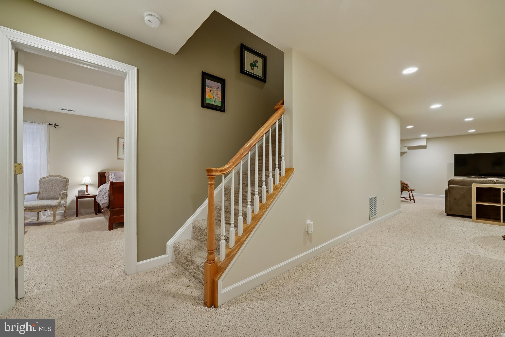 8807 Ridge Road Bethesda, MD 20817 - Photo 60 of 72 a view of a livingroom with furniture and staircase