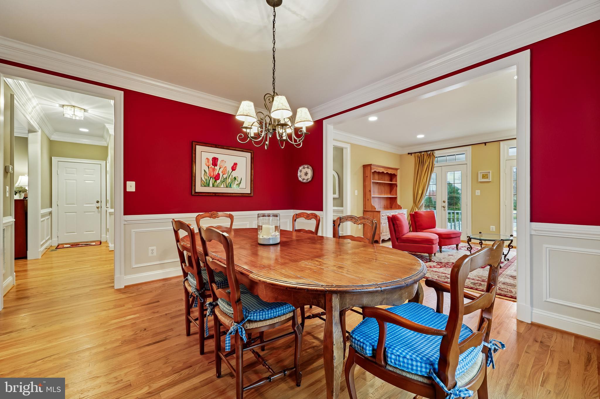 8807 Ridge Road Bethesda, MD 20817 - Photo 63 of 72 a view of a dining room with furniture and chandelier