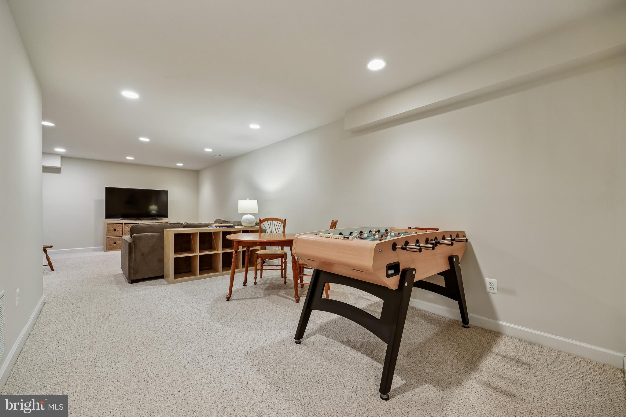 8807 Ridge Road Bethesda, MD 20817 - Photo 67 of 72 a room with furniture a table and chairs