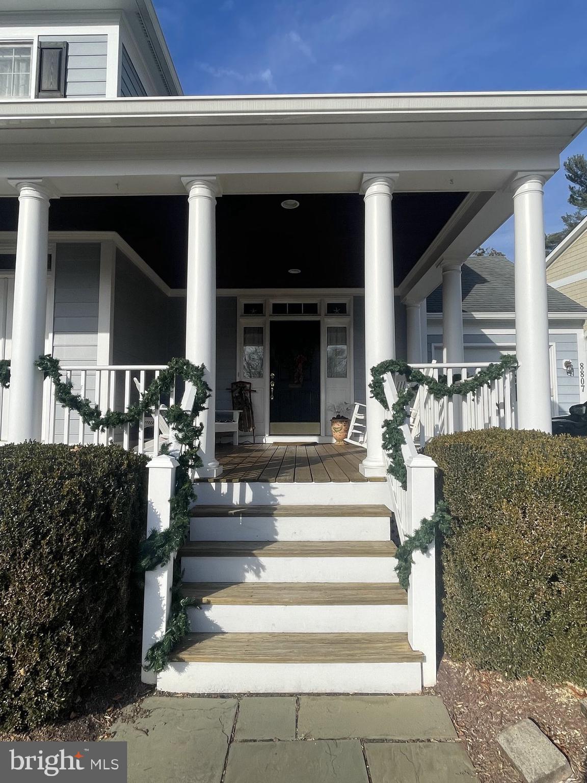 8807 Ridge Road Bethesda, MD 20817 - Photo 7 of 72 a front view of a house with a fountain
