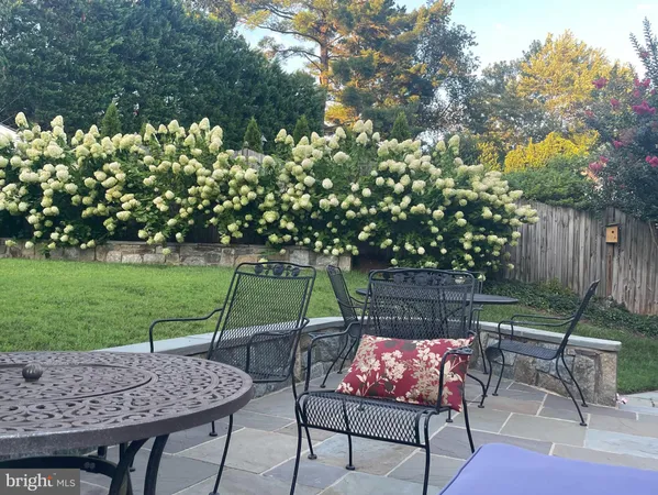 a bathroom with a toilet a sink and a mirror