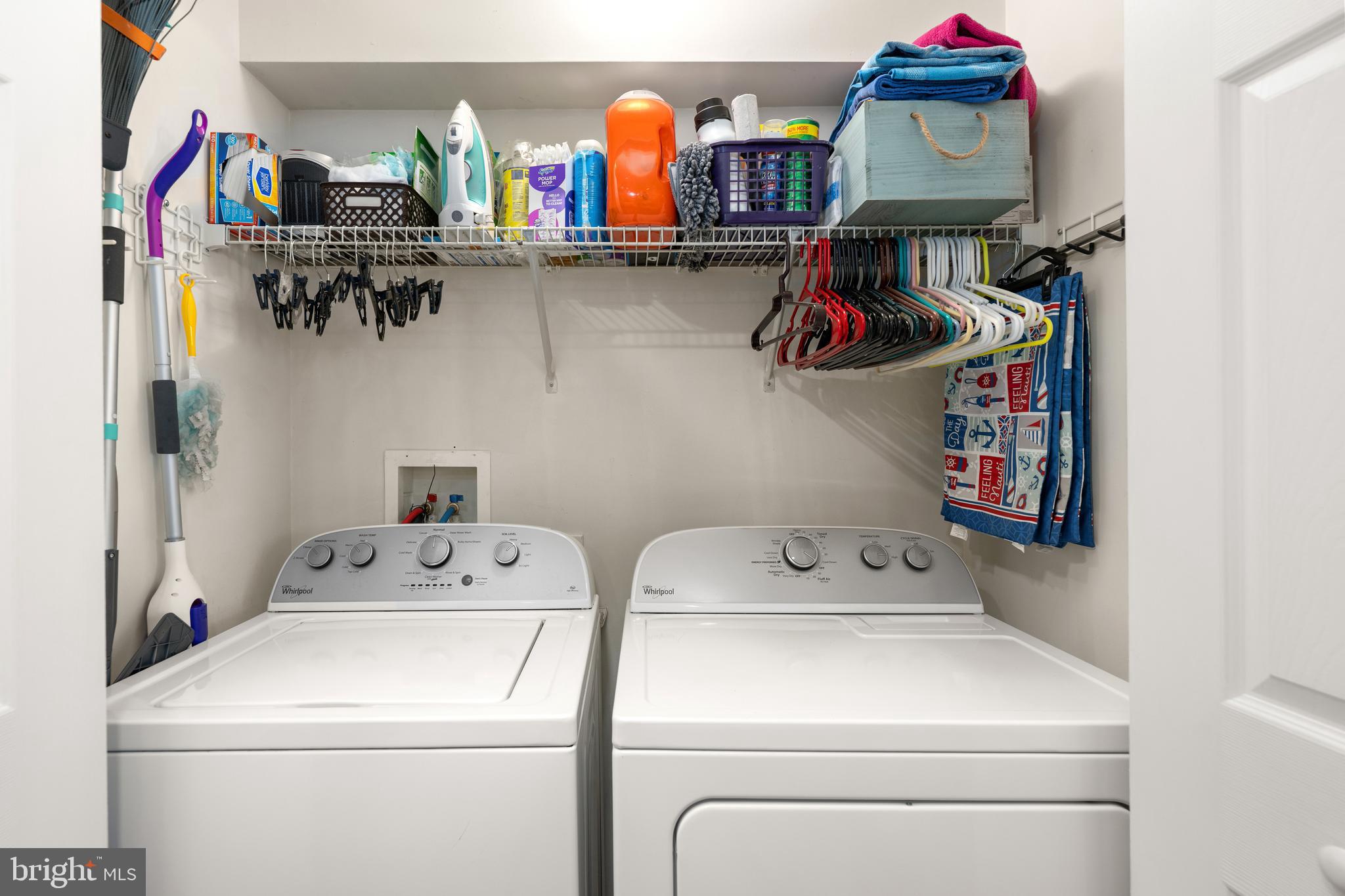 27548 Mayfield Road, Unit 42 Millsboro, DE 19966 - Photo 35 of 46 a utility room with dryer and washer
