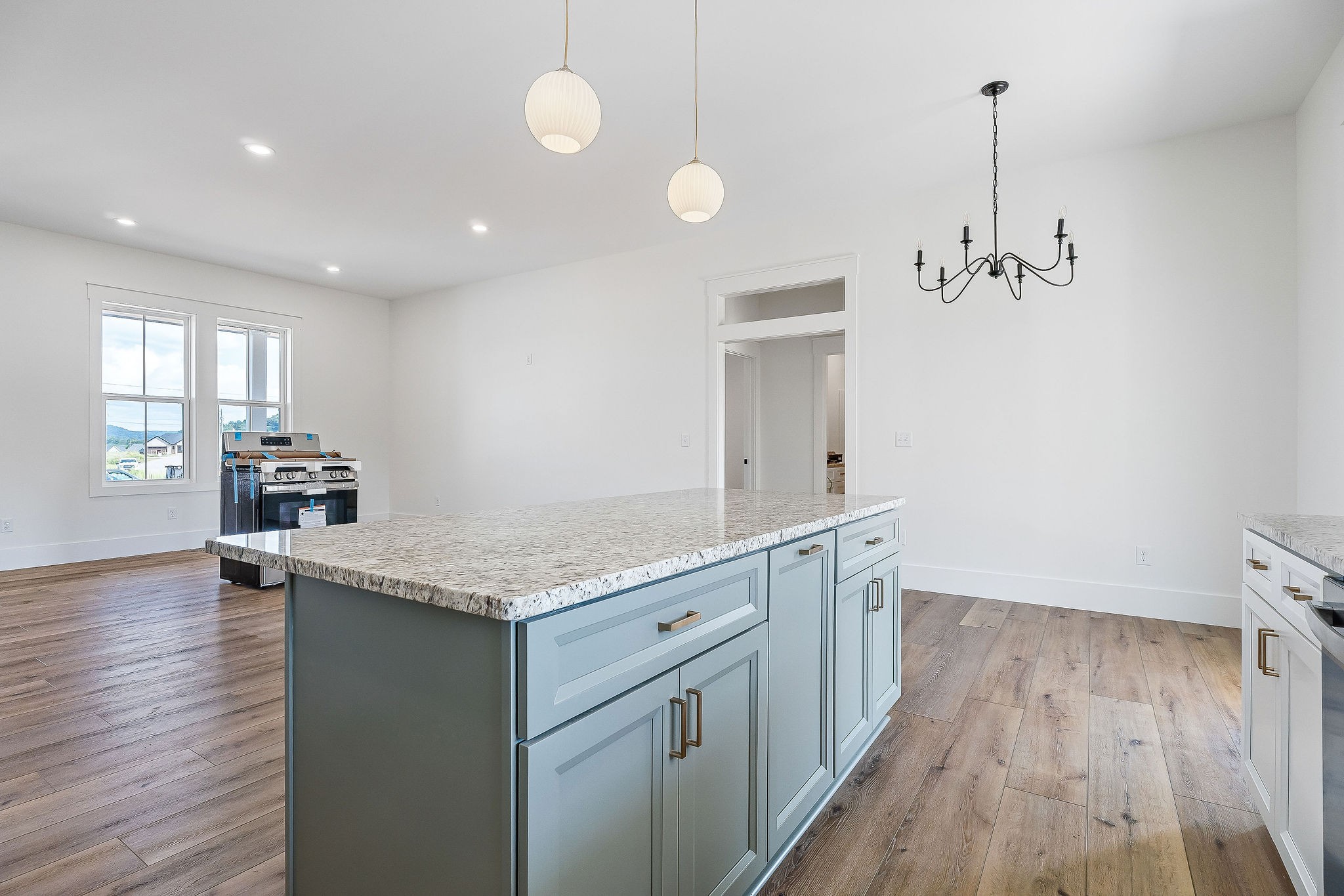 612 Harleys Ridge Road Sparta, TN 38583 - Photo 11 of 32 a kitchen with a sink and wooden floor