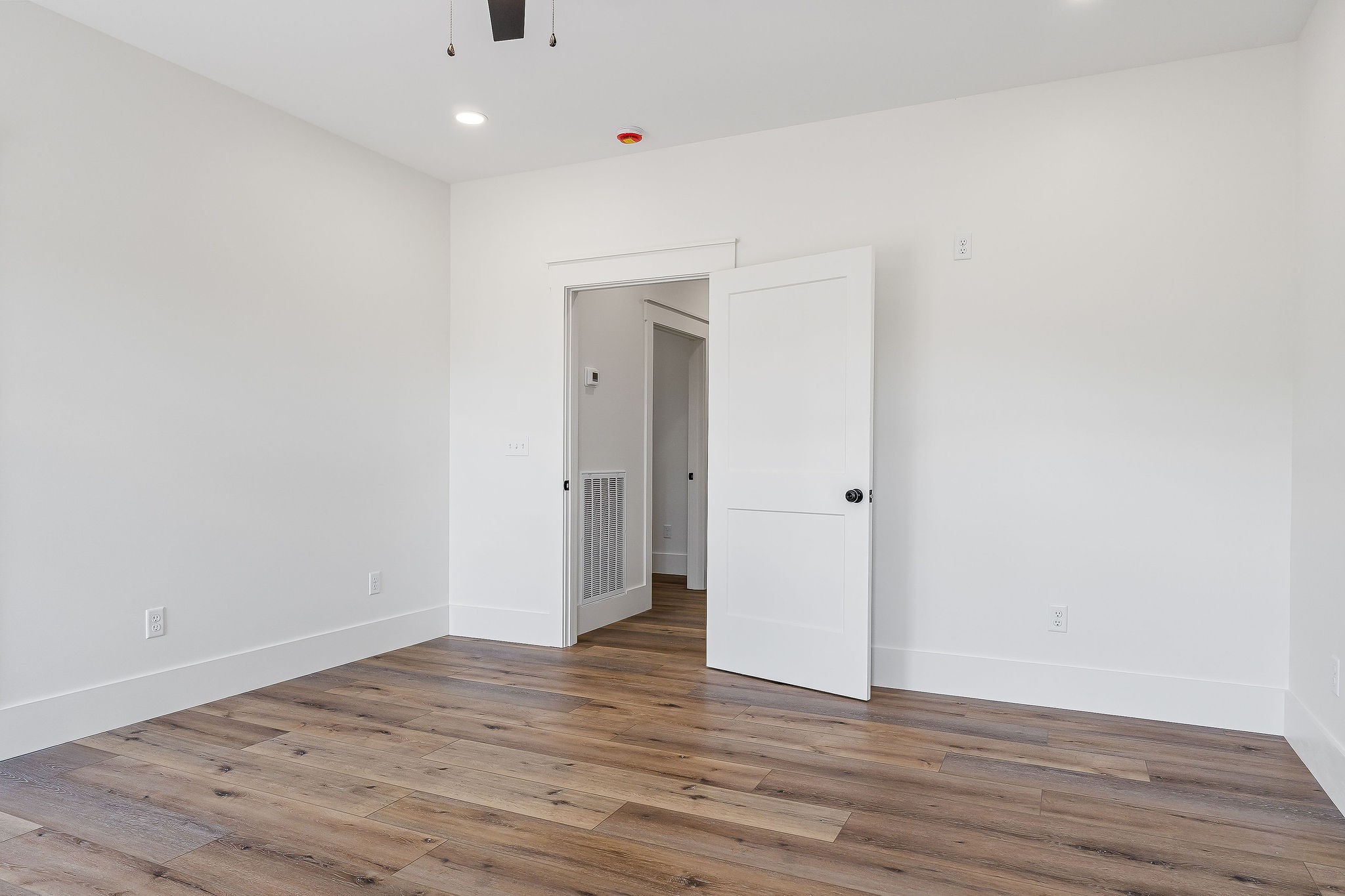 612 Harleys Ridge Road Sparta, TN 38583 - Photo 16 of 32 a view of an empty room with wooden floor