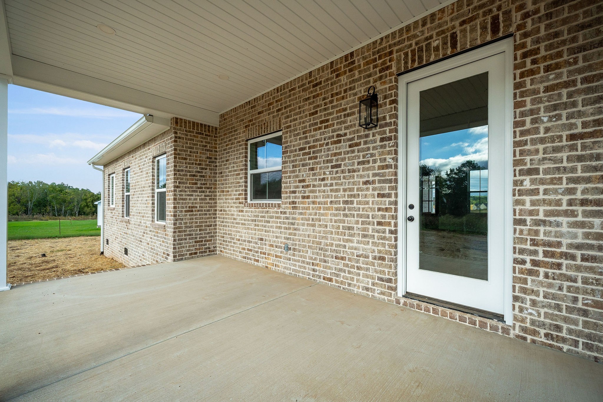 612 Harleys Ridge Road Sparta, TN 38583 - Photo 29 of 32 a view of a house with a backyard